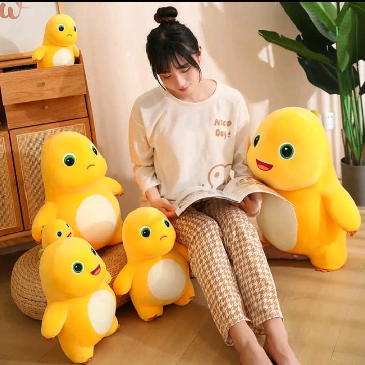 boneka dino kuning